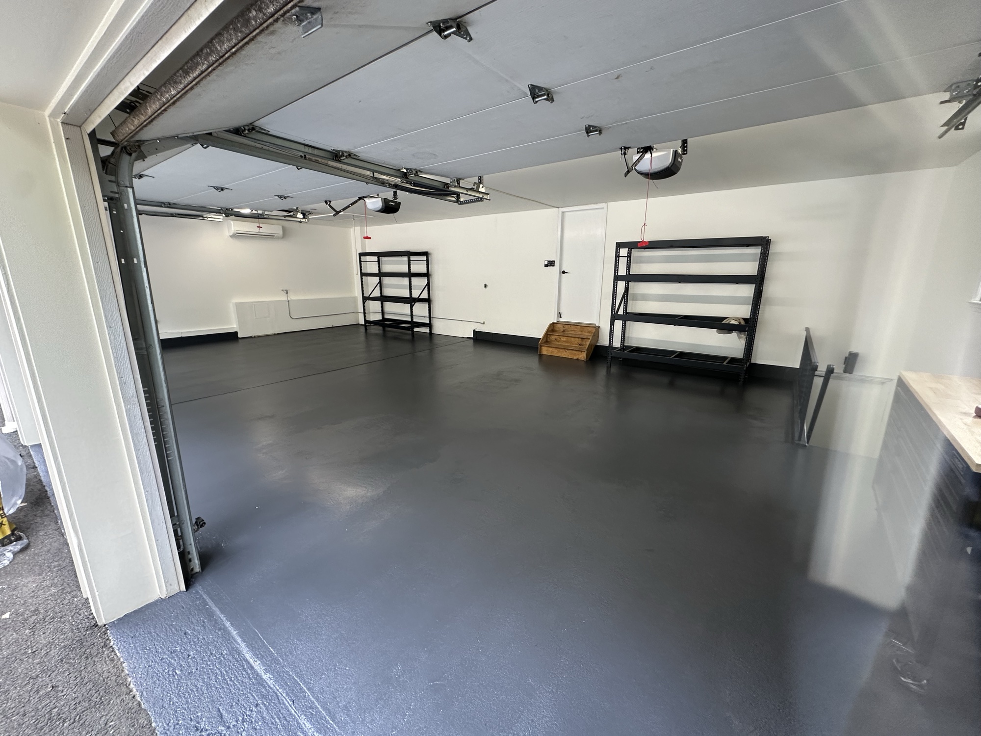 Completed epoxy garage floor with seamless finish
