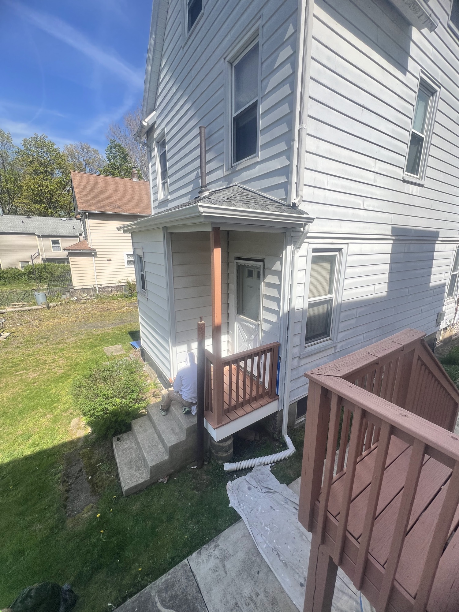 Stained porch landing with clean professional finish