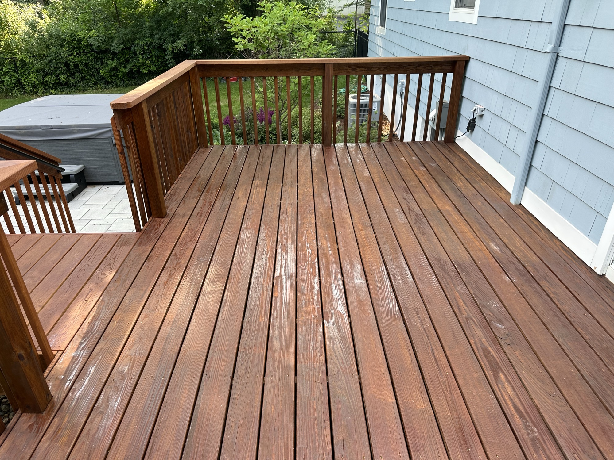 Top-down view of evenly stained deck surface