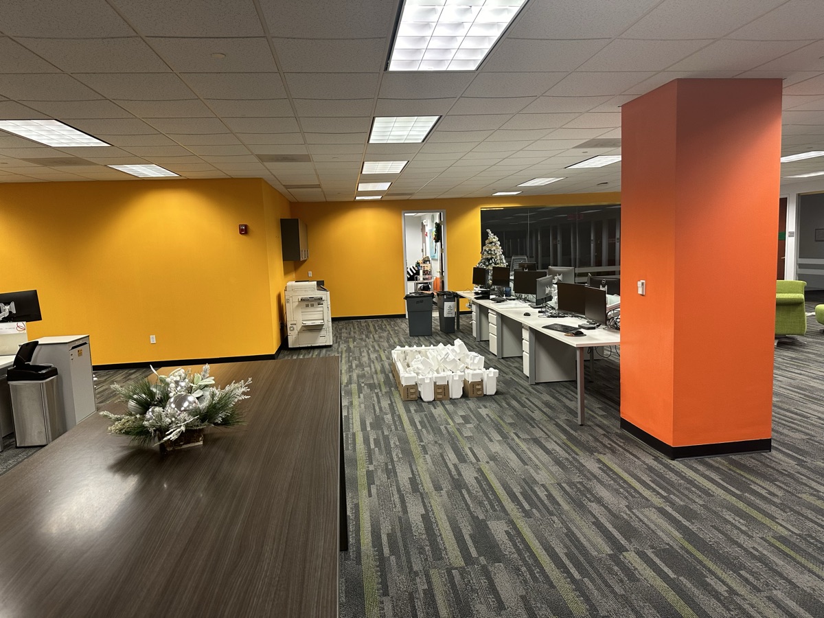 Corporate office with yellow and orange accent features