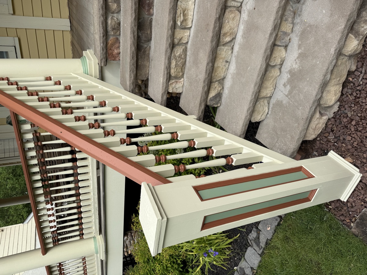Full front porch restoration with decorative railings