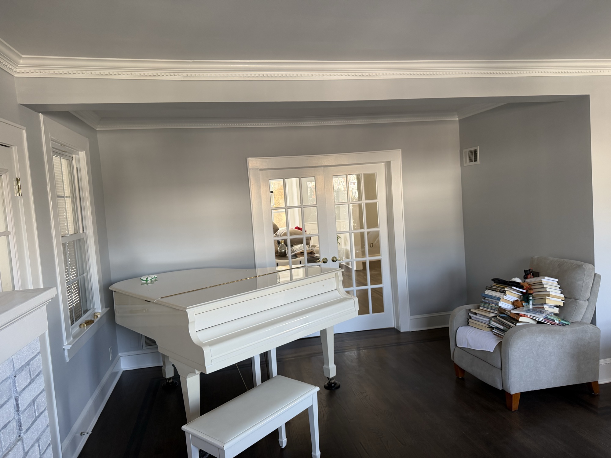 Gray living room with white crown molding, interior painting